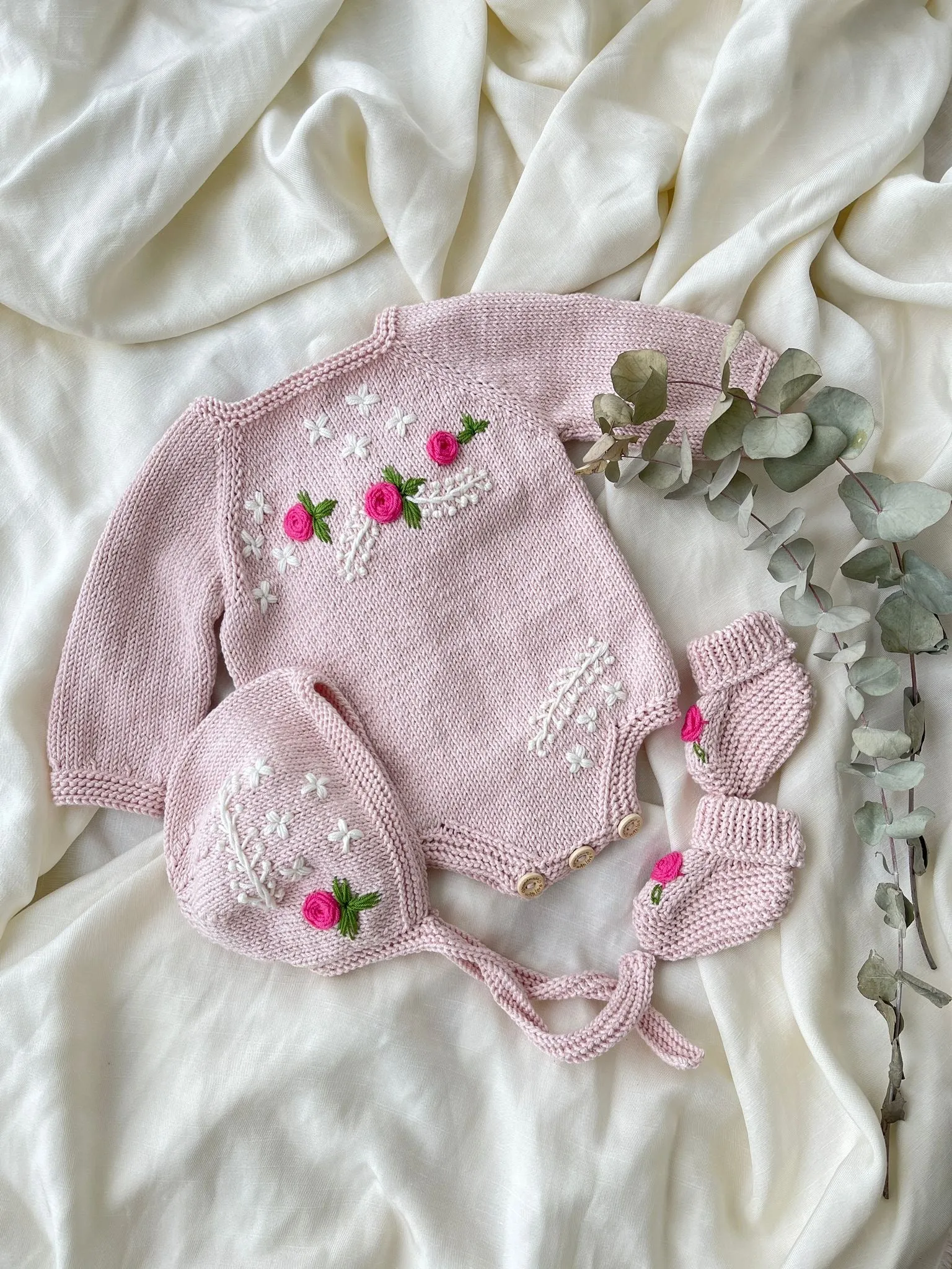 Beautiful Dusty Pink Hand Knitted 3 piece set with floral details.