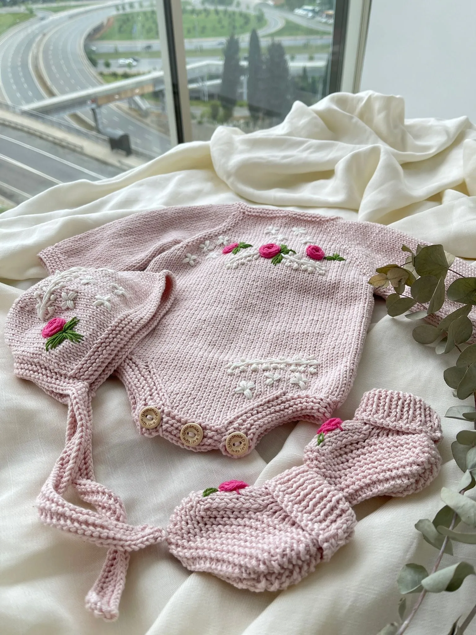 Beautiful Dusty Pink Hand Knitted 3 piece set with floral details.