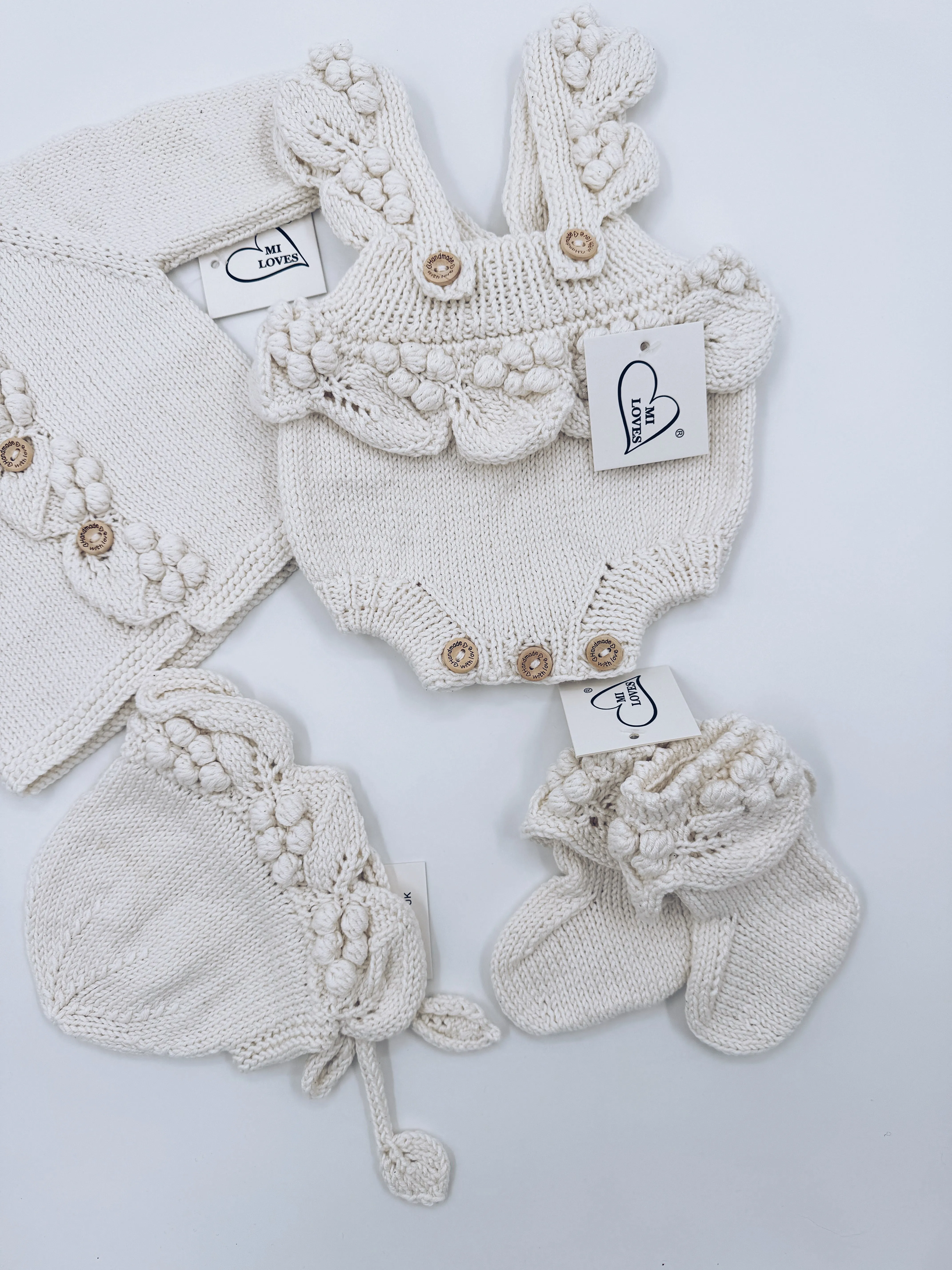 Beautiful Ivory Hand Knitted 4 piece set.Set Include Cardigan,Romper,Baby Booties and baby Bonnet.