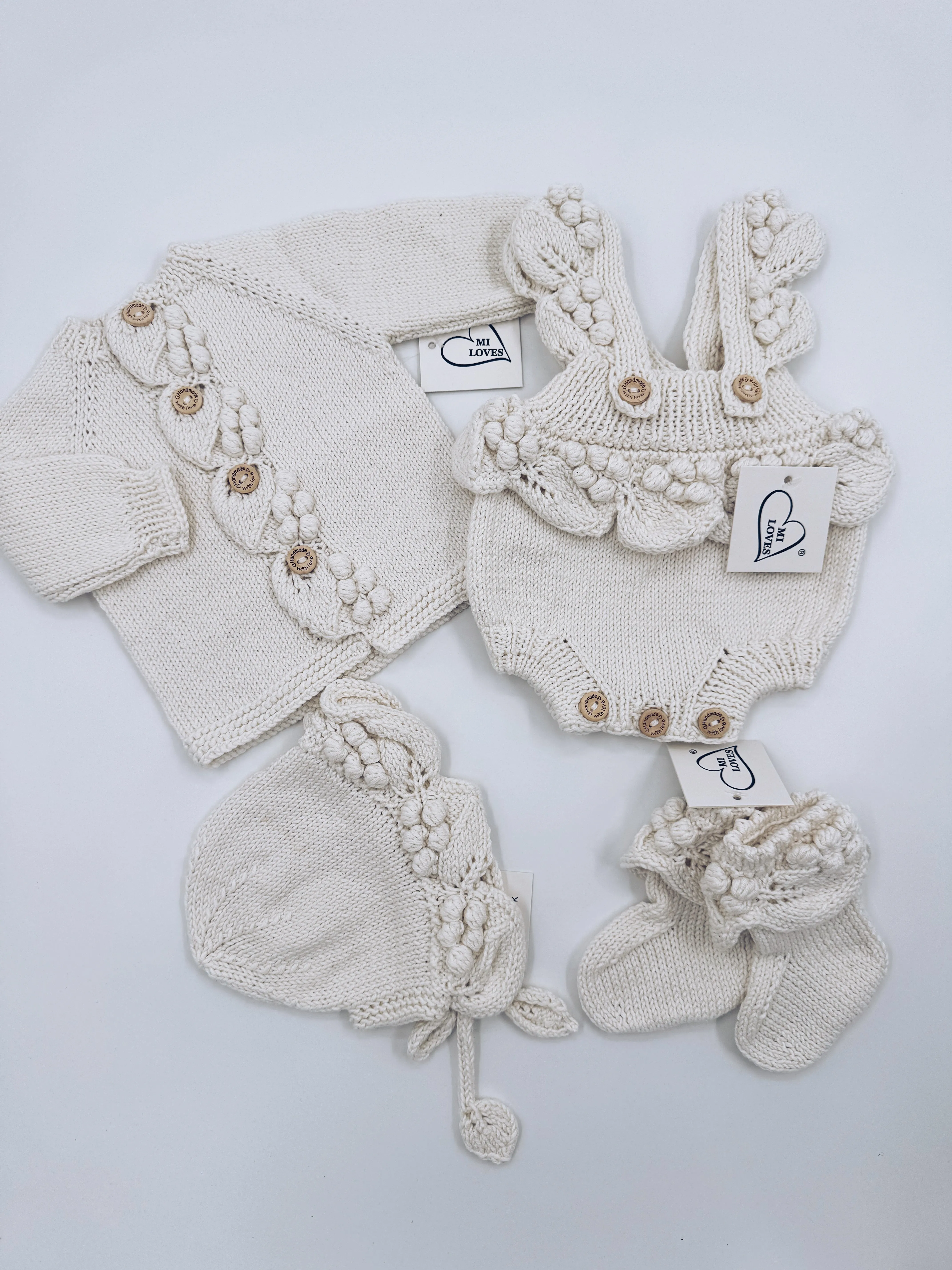 Beautiful Ivory Hand Knitted 4 piece set.Set Include Cardigan,Romper,Baby Booties and baby Bonnet.