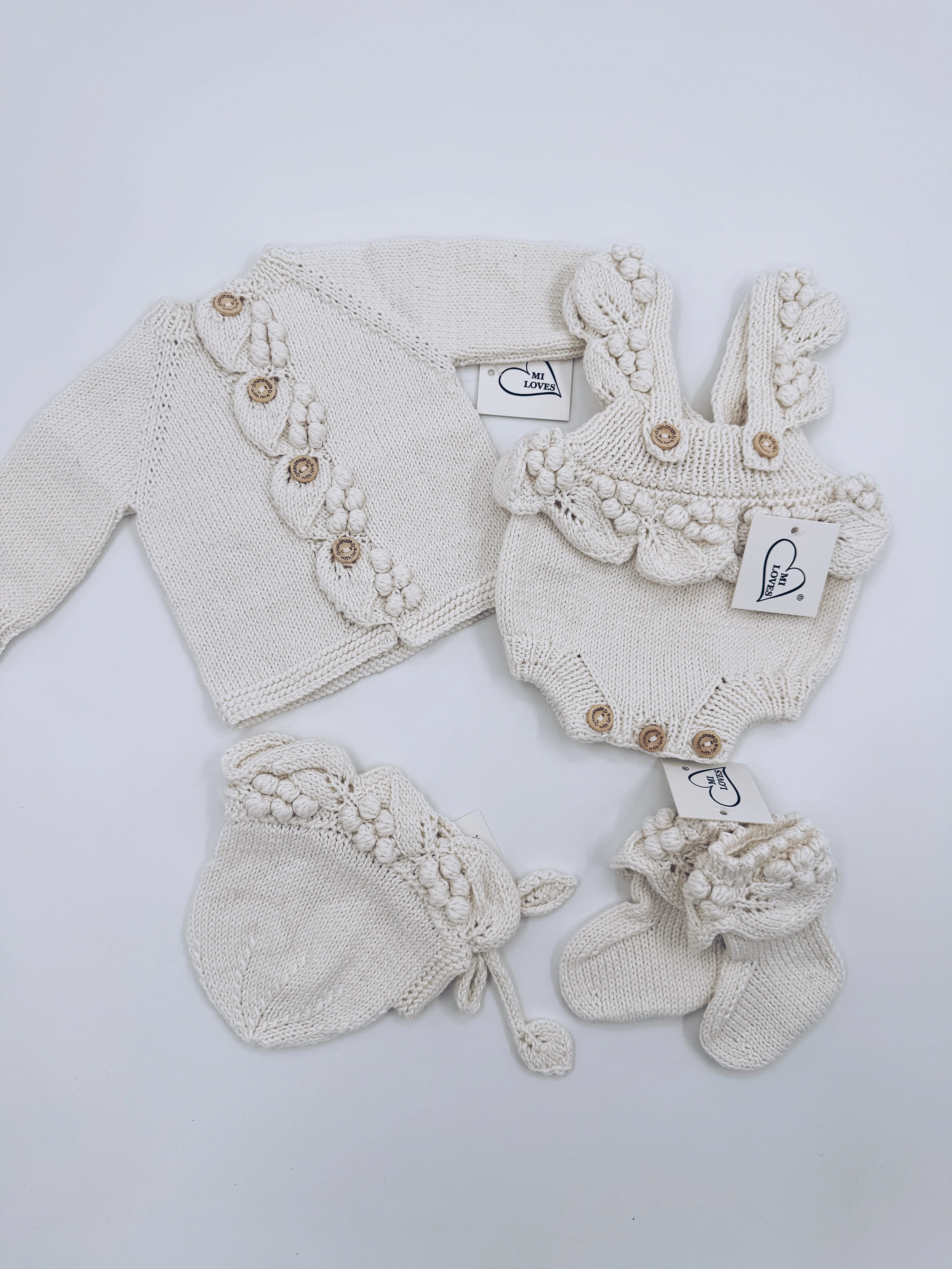 Beautiful Ivory Hand Knitted 4 piece set.Set Include Cardigan,Romper,Baby Booties and baby Bonnet.