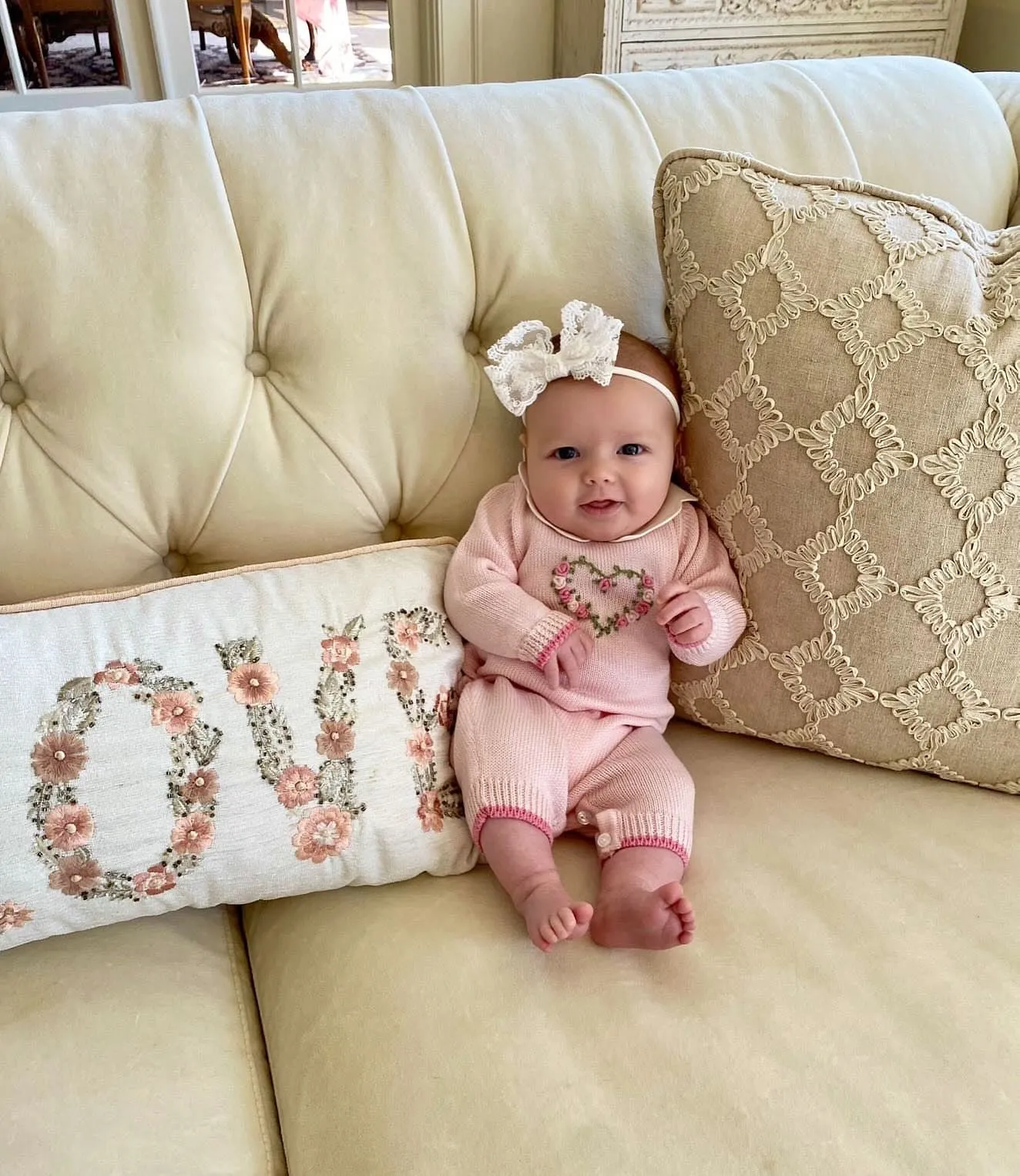 Beautiful Knitted Merino Wool Baby Girl Blanket with hand embroidery flower details.