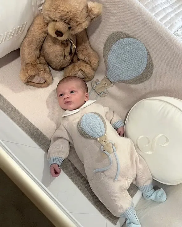Beautiful knitted Merino Wool Cream/Blue Baby Romper with Bear/Air Ballon details.