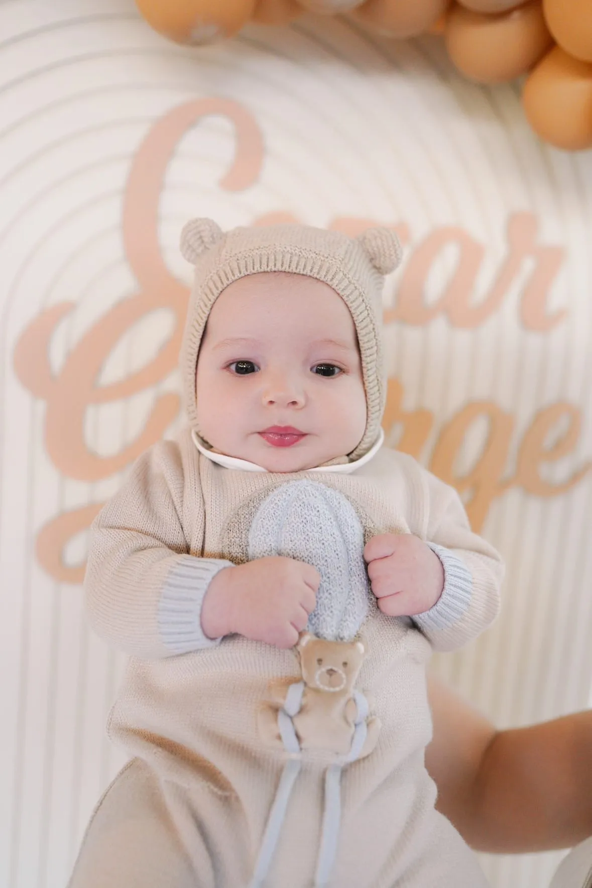 Beautiful knitted Merino Wool Cream/Blue Baby Romper with Bear/Air Ballon details.