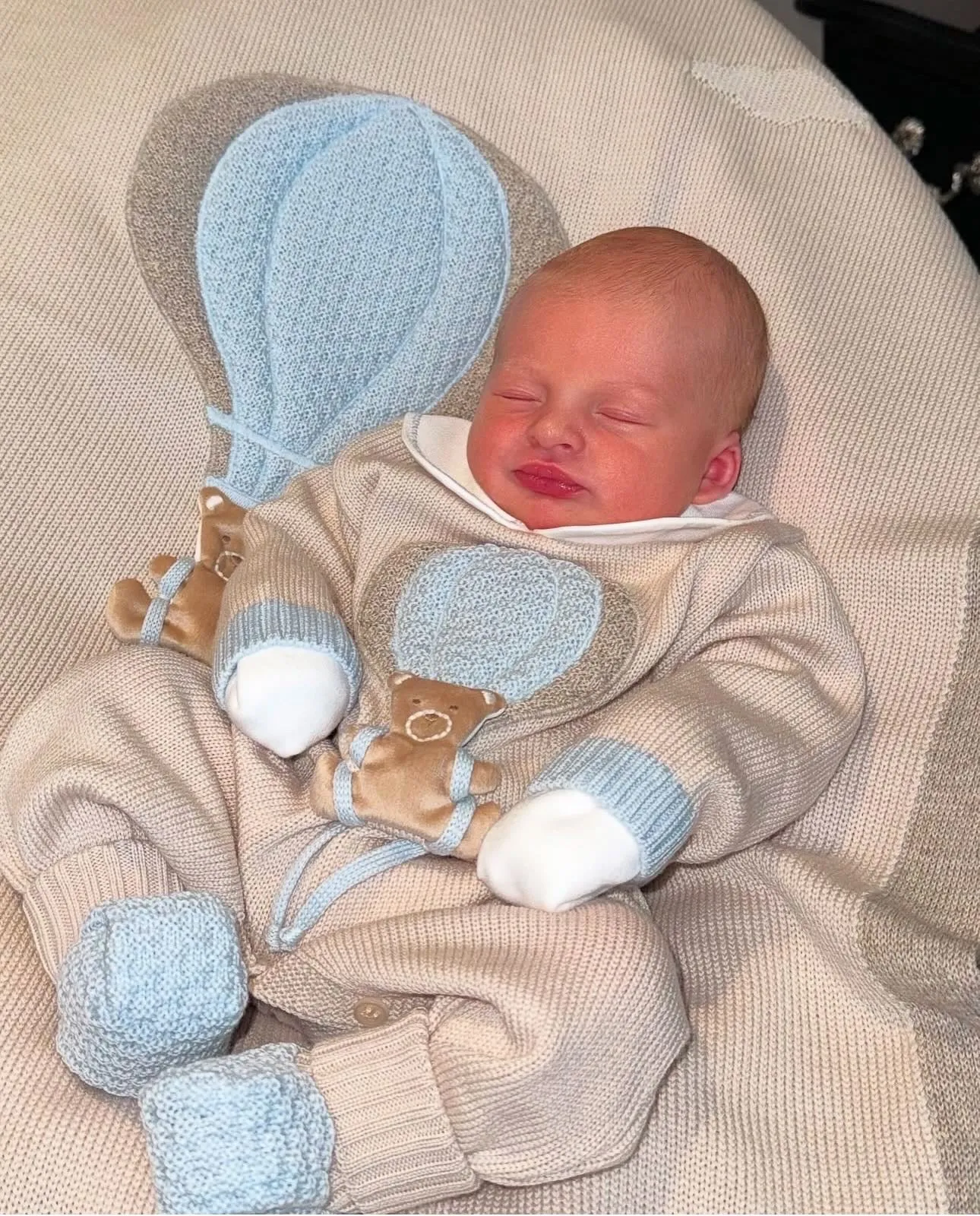 Beautiful knitted Merino Wool Cream/Blue Baby Romper with Bear/Air Ballon details.