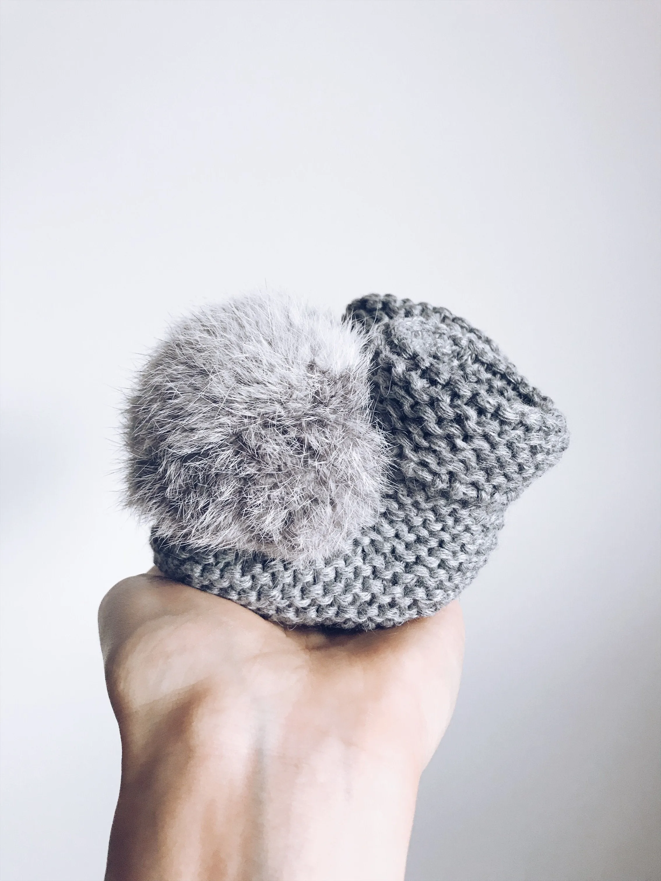 MILOVES Signature Hand Knitted baby booties with rabbit fur pompom