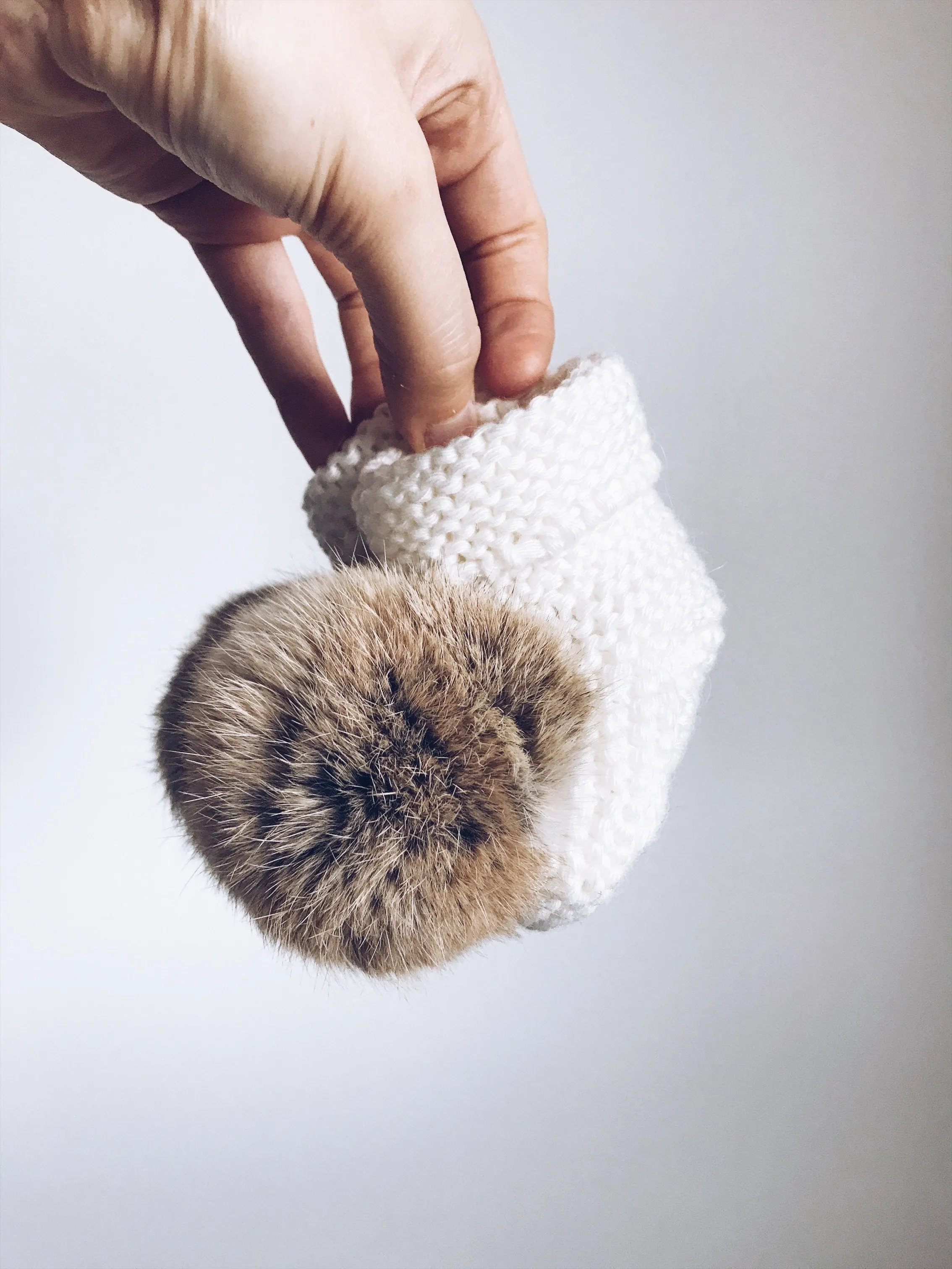MILOVES Signature Hand Knitted baby booties with rabbit fur pompom