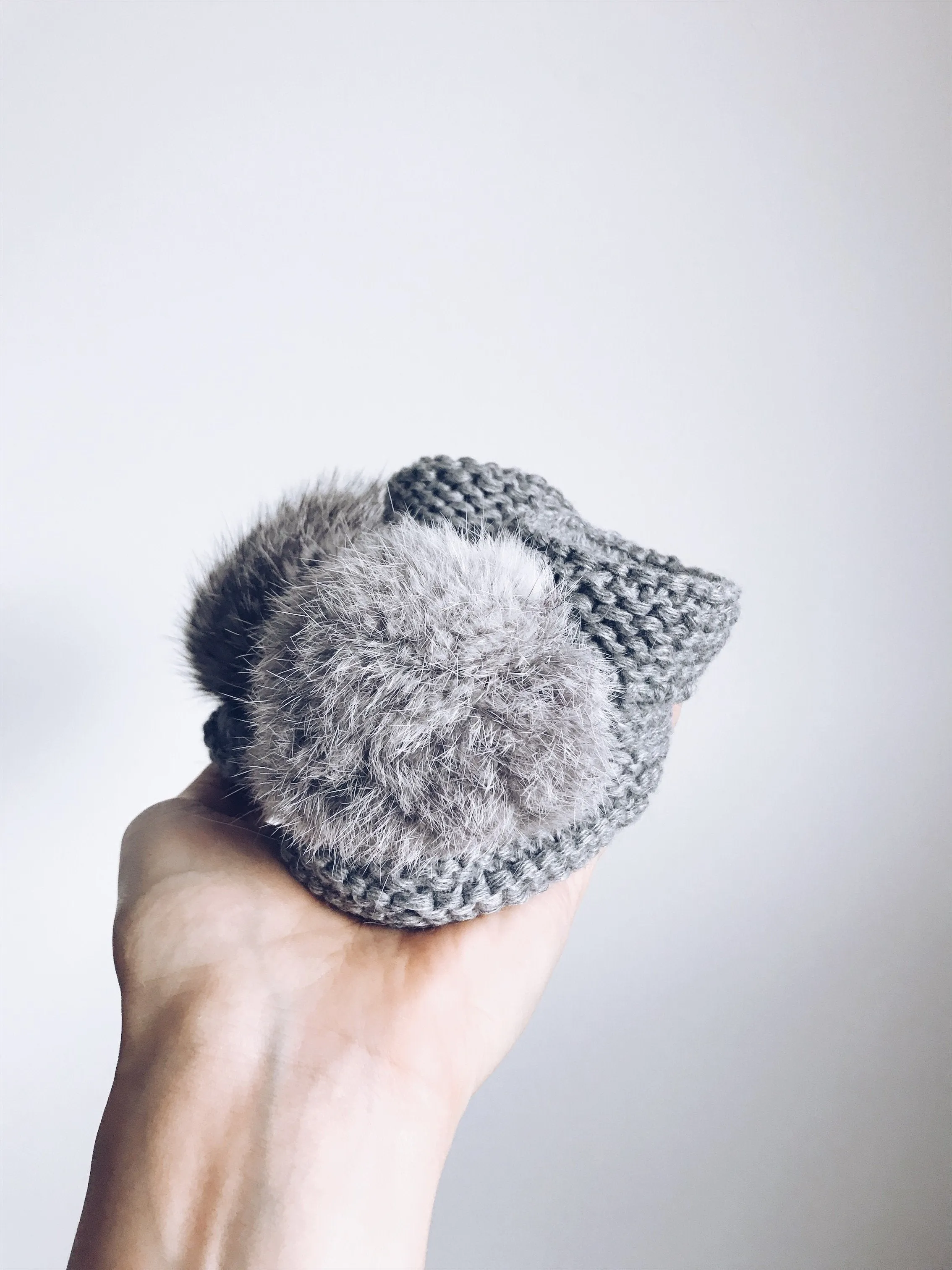 MILOVES Signature Hand Knitted baby booties with rabbit fur pompom